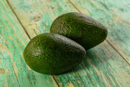 Raw ripe green juicy avocado tropical fruit