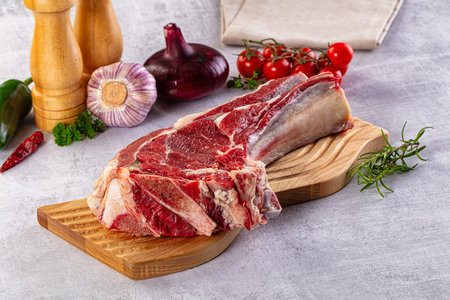 Raw prime beef steak with bone rib eyeの写真素材