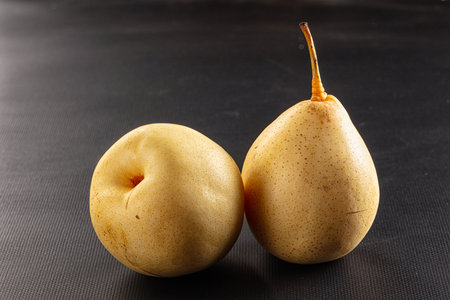 Ripe sweet yellow organic Chinese pearsの写真素材