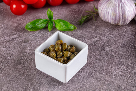 Canned marinated salted capers buds heap