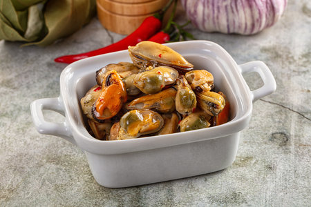 Tasty mussels in oil and spicesの写真素材