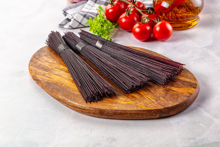Raw black rice noodles lines pastaの写真素材