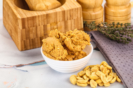 Crunchy peanut butter fat product for breakfast