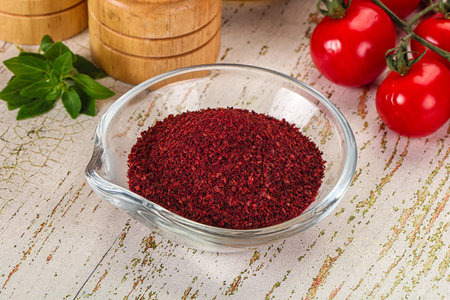 Natural organic Sumah powder for culinary in the bowl
