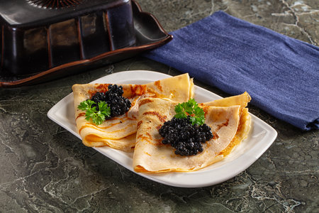 luxury pancake with sturgeon black caviarの写真素材