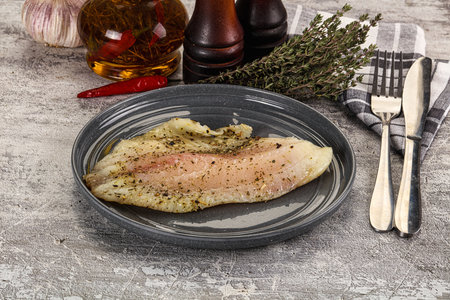 Baked tilapia fish fillet with spices