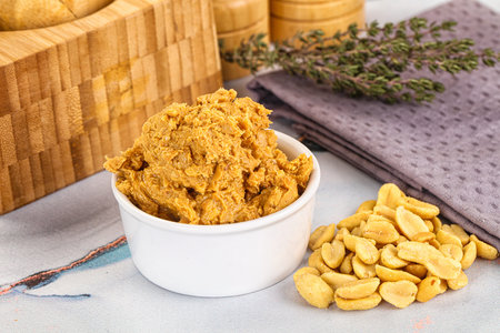 Crunchy peanut butter fat product for breakfast