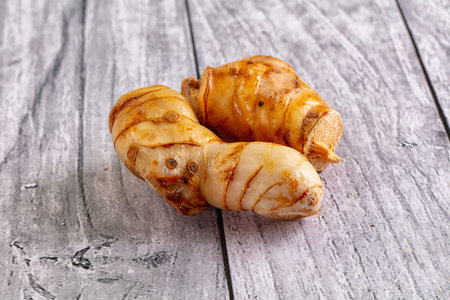Raw galangal roots heap seasoning aroma