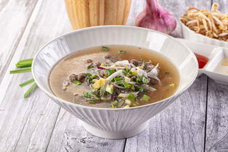 Vietnamese Pho Bo soup with beef and noodles