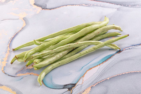 Raw green string beans heap for cooking