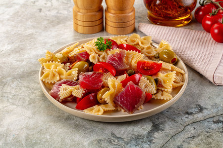 Pasta Farfalle with fresh Tuna fish and tomatoの写真素材