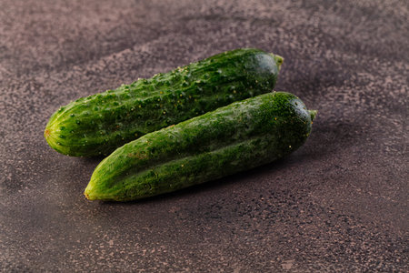 Raw fresh ripe green cucumbersの写真素材