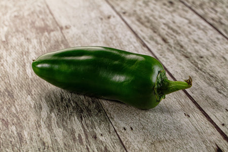 Raw ripe green jalapeno burning pepper