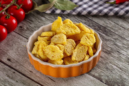 Fried crispy crouton bread slices in the bowl