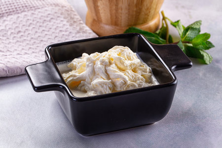 Italian soft young stracciatella creamy cheeseの写真素材