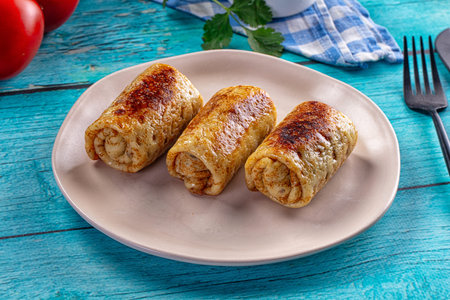 Stuffed homemade pancakes with minced meat