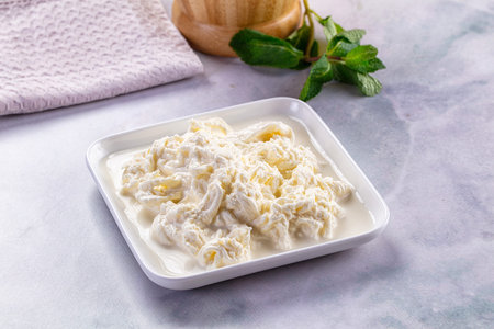 Italian soft young stracciatella creamy cheese