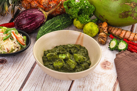 Vegetarian Indian cuisine - Palak paneer cheese with spinach