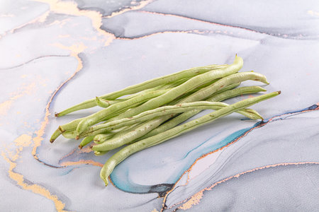 Raw green string beans heap for cooking