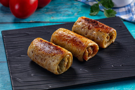 Stuffed homemade pancakes with minced meat