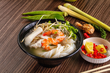 Vietnamese soup Pho with seafood - prawn