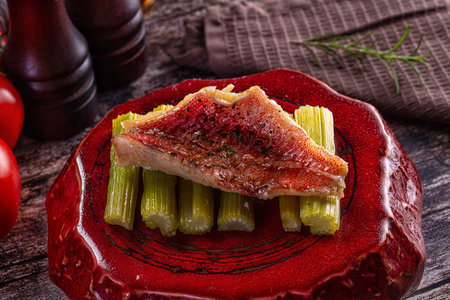 Steamed grouper fish fillet with celery cticks