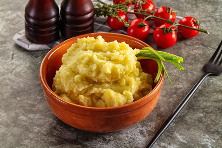 Mushed boiled potato homemade puree with milk