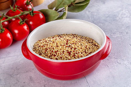 Ðry raw quinoa seeds heap in the bowlの写真素材