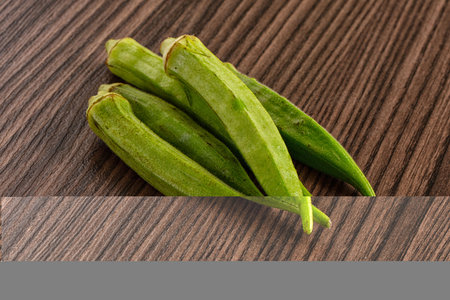 Raw organic green okra vegetable for vegan cuisine