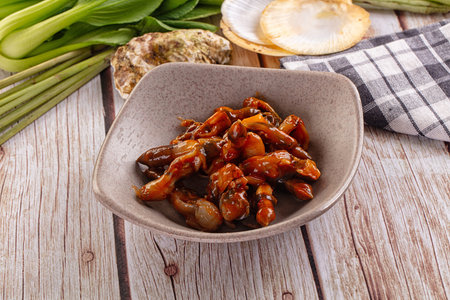 Razor shell mollusk with spicy sauce