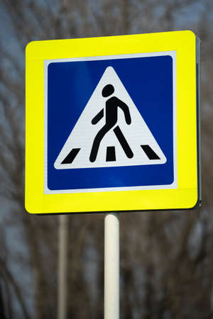 road sign warning pedestrian crossingの写真素材
