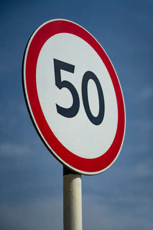 Road signs speed limit 50 km per hour. Close up shot raw footageの写真素材