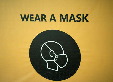 Wear a mask. COVID-19. Important sign.の写真素材