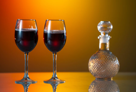 Grape wine with cheese isolation on sunset backgroundの写真素材