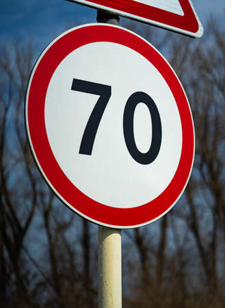 Road signs speed limit 70 km per hour. Close up shot raw footageの写真素材