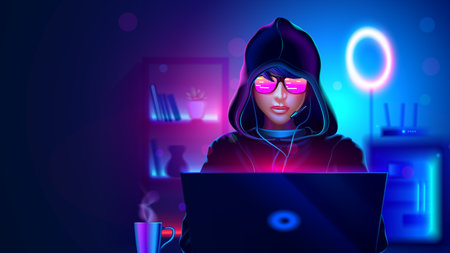 A teenage gamer in a hood is playing at a gaming laptop. A teenage girl or a boy in a hood is a hacker, a programmer writes code on a laptop in a dark room. A teenager is playing on a computer.のイラスト素材