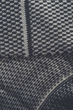 the background of knitted cloths closeupの写真素材