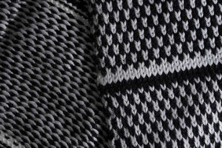 the background of knitted cloths closeupの写真素材