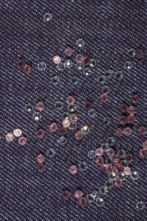 sewing accessories on the background of denim closeup