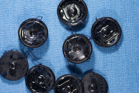 sewing accessories on the background of denim closeupの写真素材