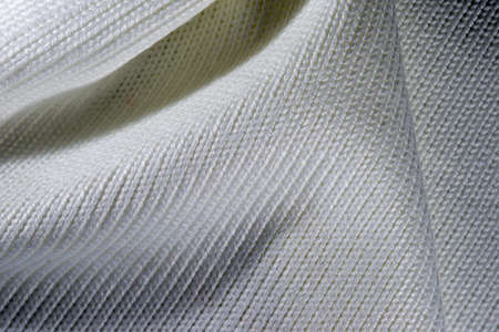 decorative background of the knitted fabric closeup