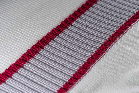 decorative background of the knitted fabric closeup