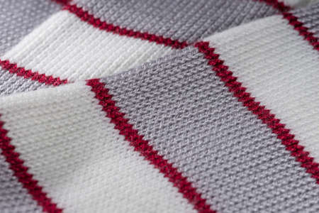 decorative background of the knitted fabric closeup