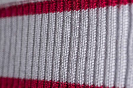decorative background of the knitted fabric closeup