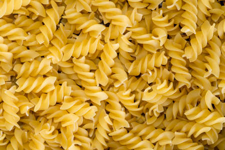 delicious food background of yellow pasta closeupの写真素材