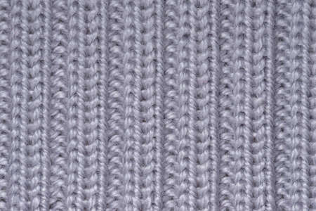 decorative background of the knitted fabric closeupの写真素材