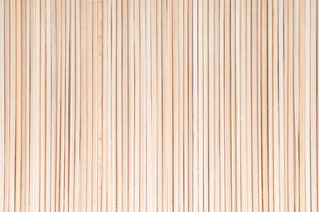 the background is made of thin bamboo sticks