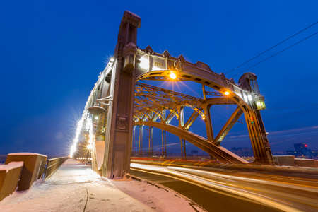 Night landscape with lights from cars on the bridge | Saint-Petersburg