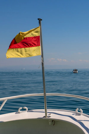 Yellow and Red Oscar Flag Indicating Man Overboardの写真素材