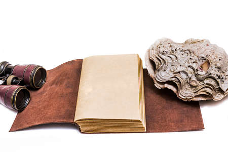 Opened old leather bookの写真素材